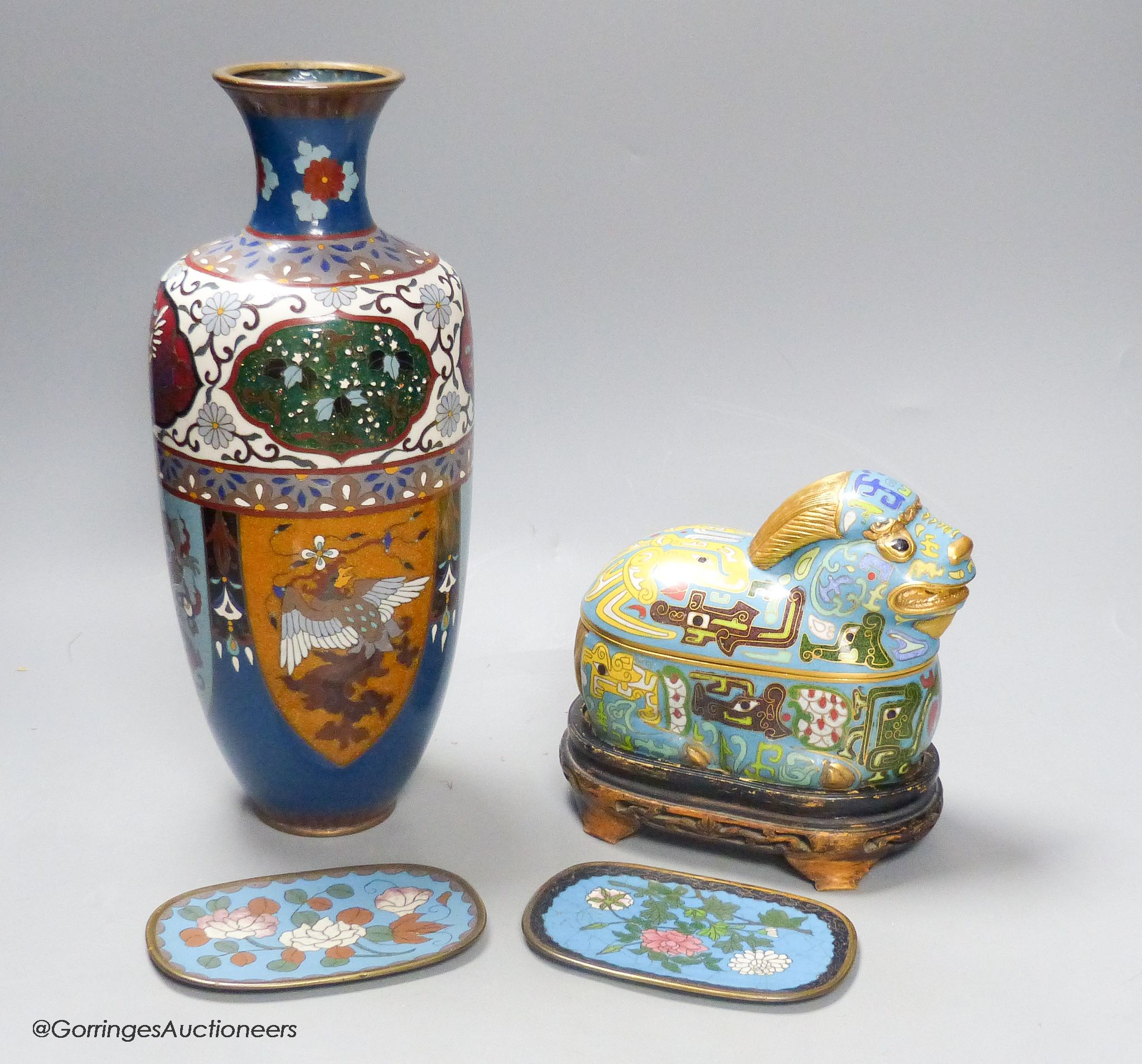 A Japanese cloisonne enamel vase, two similar dishes and a 20th century Chinese cloisonne enamel mythical beast box & cover